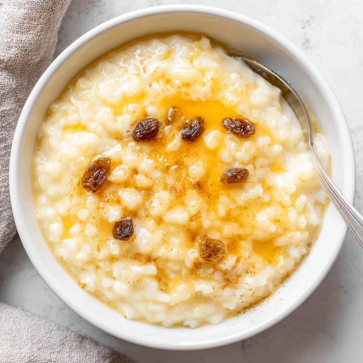 Spoonful of Delicious Condensed Milk Baked Rice Pudding Recipe To Try, silky slightly caramelized