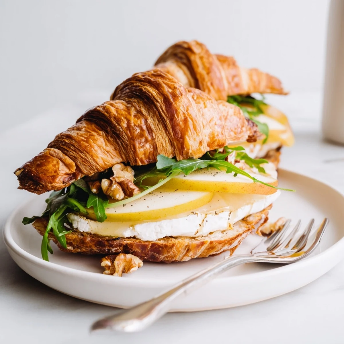 Apple Goat Cheese Croissant Sandwich layered with crisp apple slices and creamy cheese