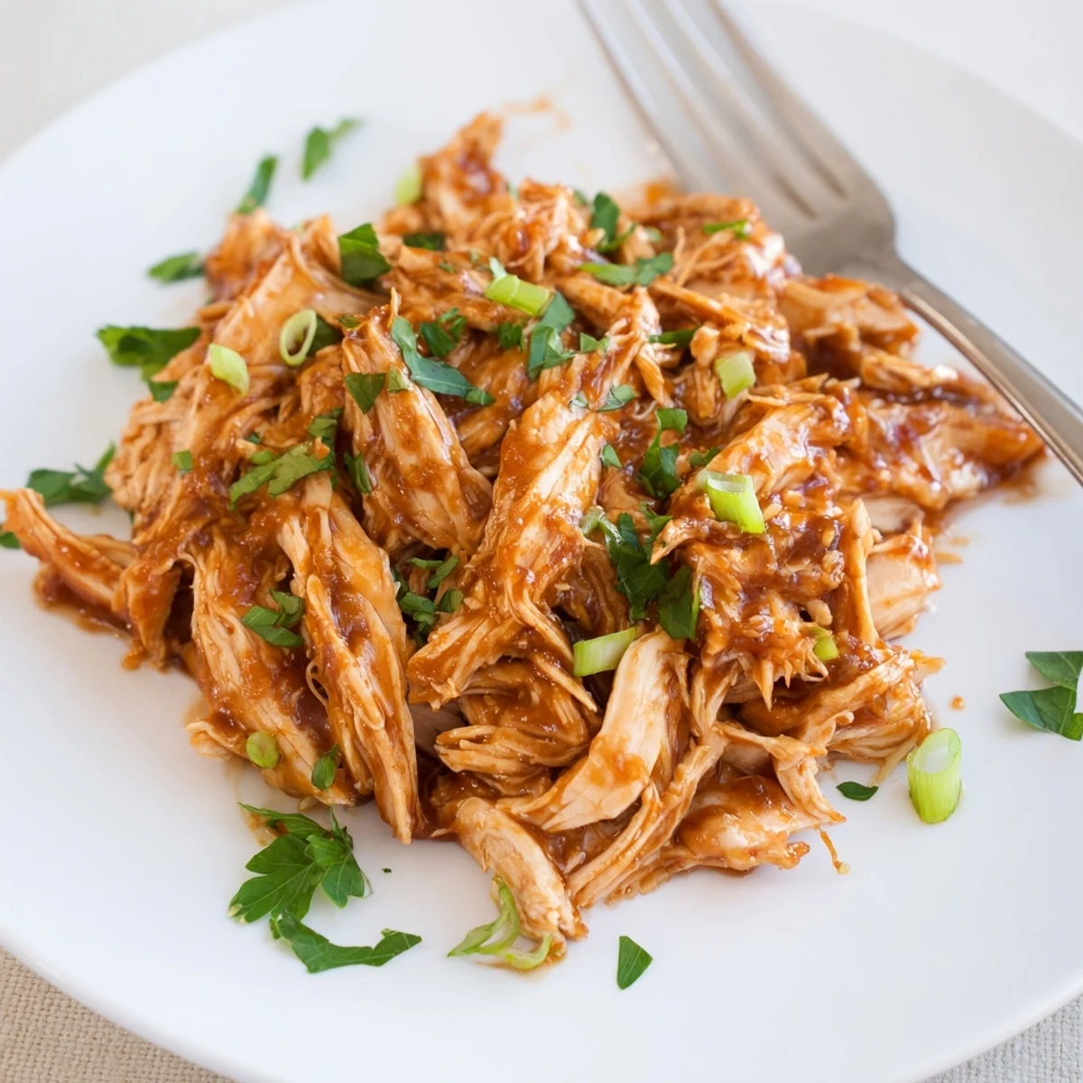 Hearty Slow Cooker Brown Sugar Garlic Chicken slow-cooked to sticky, caramelized perfection.